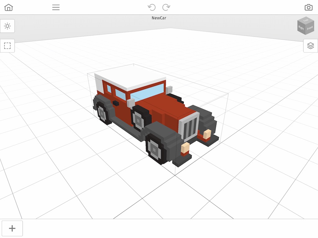 A voxel car model in the Mega Voxels editor.