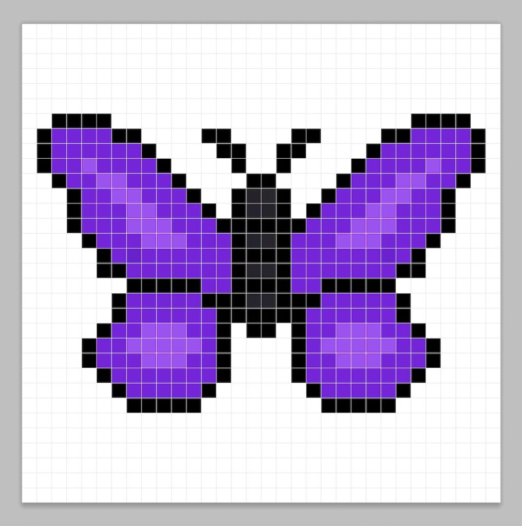 Simple pixel art butterfly with solid colors